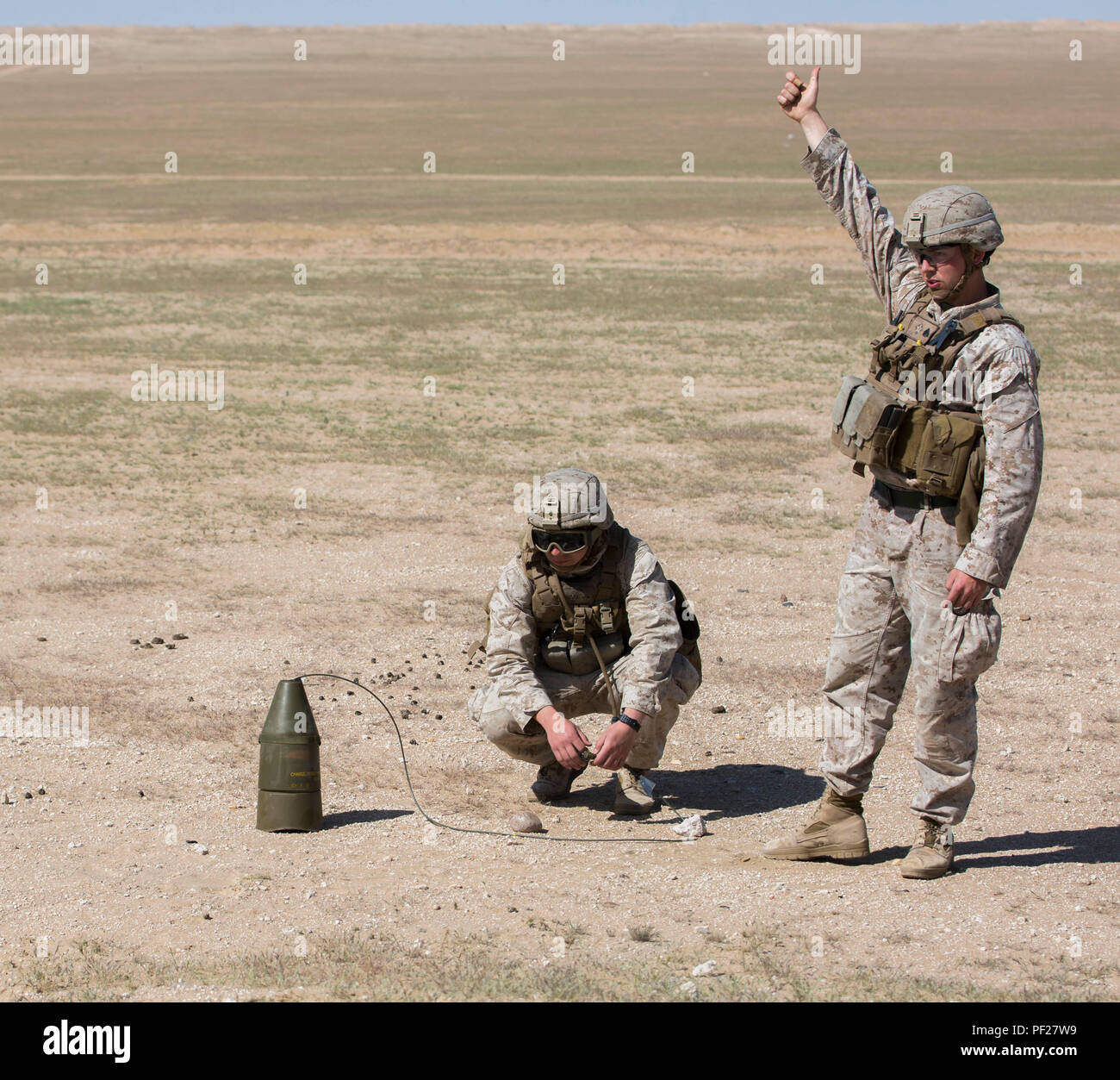 U.S. Marines with Combat Logistics Battalion 26, 26th Marine Expeditionary Unit (MEU), prepare to detonate a 15 pound M2A4 cone shaped charge during a demolitions range at Camp Buerhing, Kuwait Feb. 24, 2016. The U.S. Navy, U.S. Marine Corps and Kuwait Armed Forces are conducting PHIBLEX 16, a bilateral amphibious and ground exercise, to enhance operational readiness and improve interoperability between U.S. and regional partner forces. The 26th MEU is embarked with the Kearsarge Amphibious Ready Group and is deployed to maintain regional security in the U.S. 5th Fleet area of operations. (U.S Stock Photo