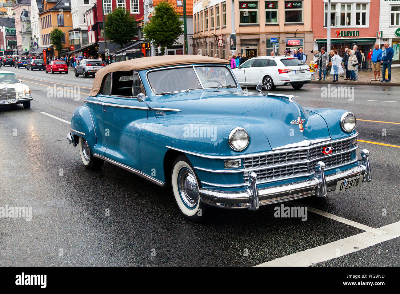 CHRYSLER NEW YORKER, 1948 model, six seats, blue. Classic cars parading through the port area in Bergn, Norway. Fjordsteam 2018,. Stock Photo
