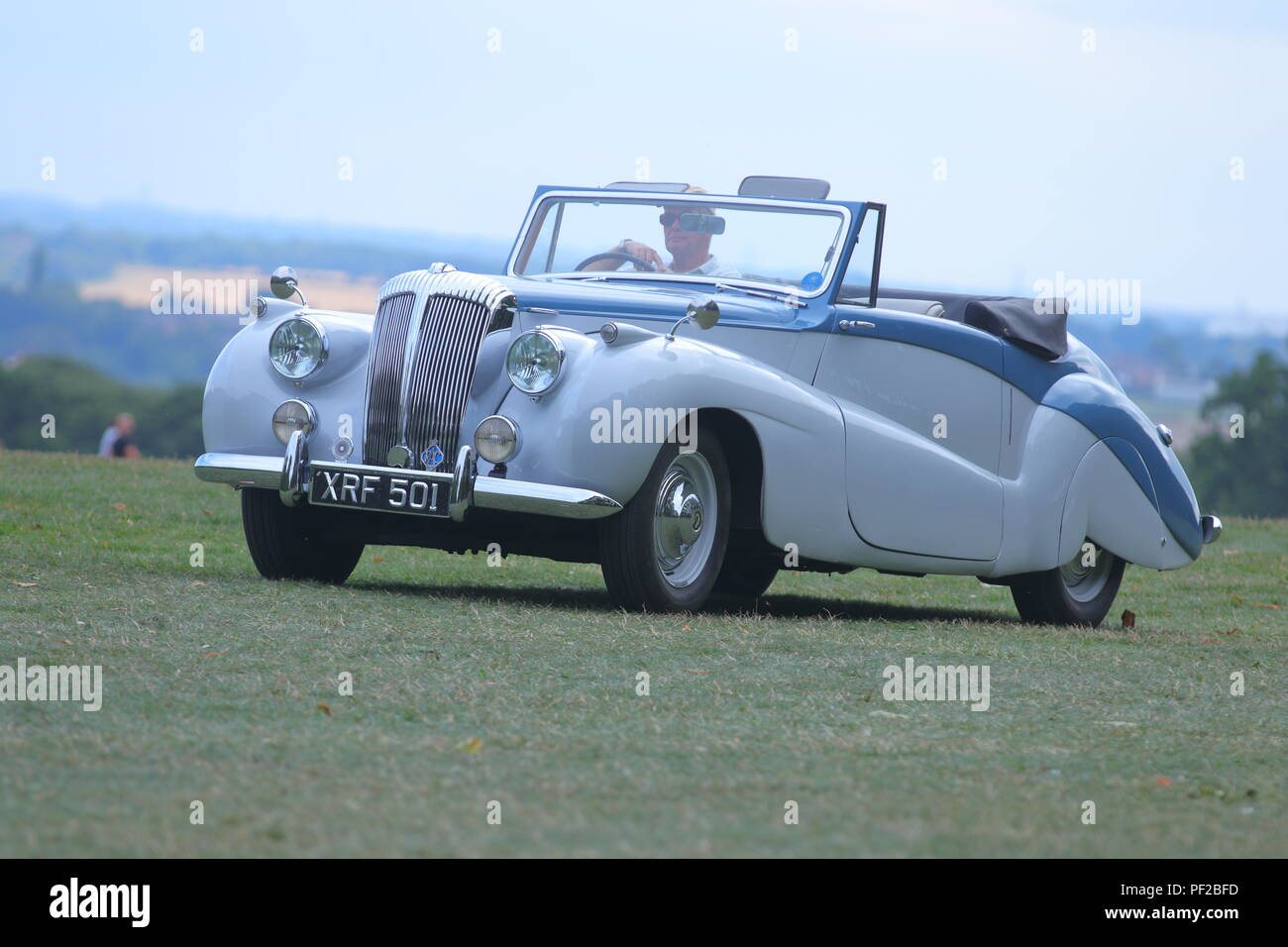 A Daimler Special Sports car leaving a Classic Car Show at Temple