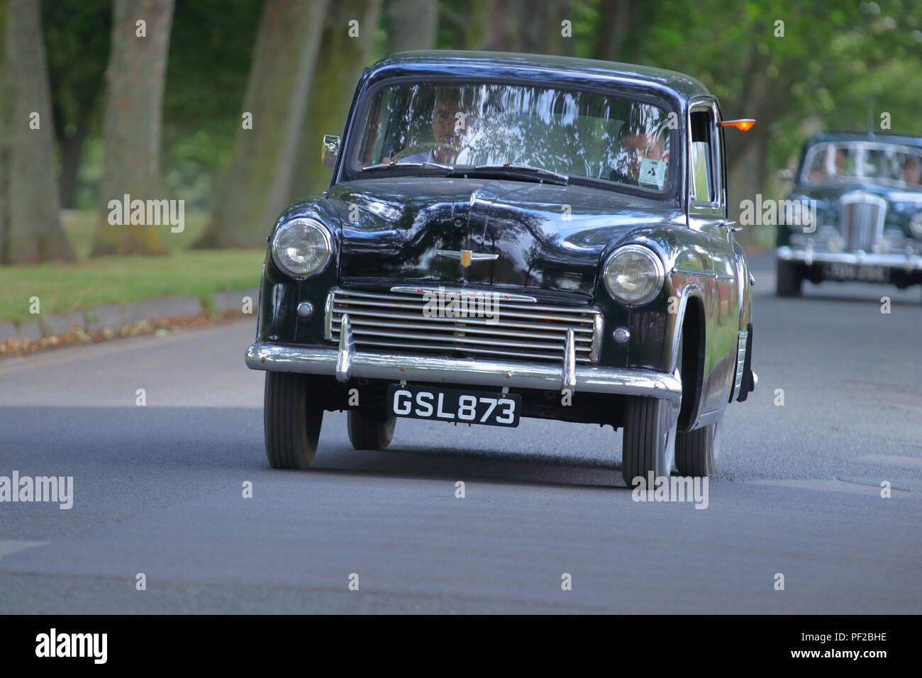 A 1954 Hillman Minx leaving a classic car show at Temple Newsam in Leeds, West Yorkshire Stock Photo