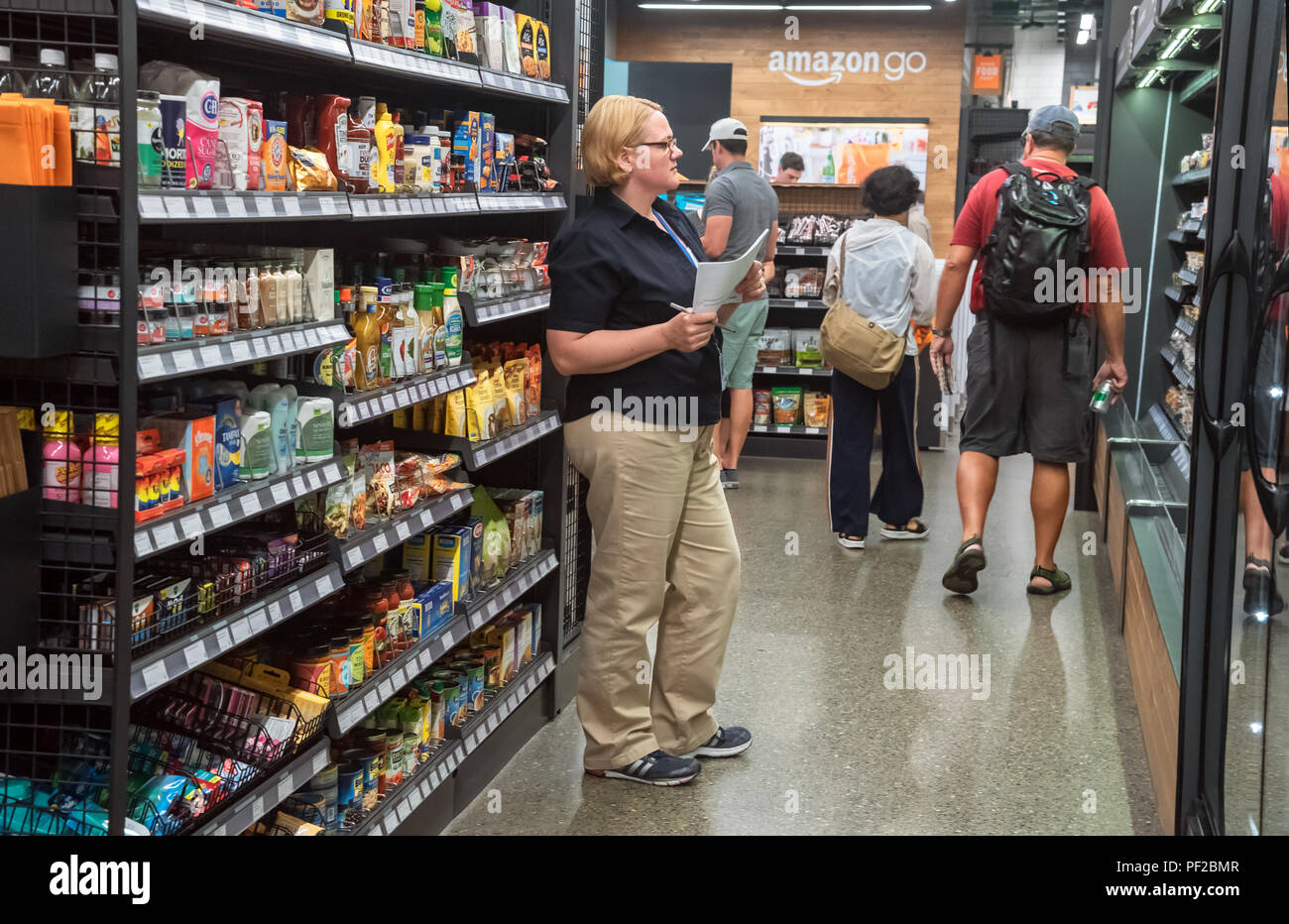 A store employee keeps a sales record, Amazon Go grocery store, Seattle, WA, USA Stock Photo Alamy