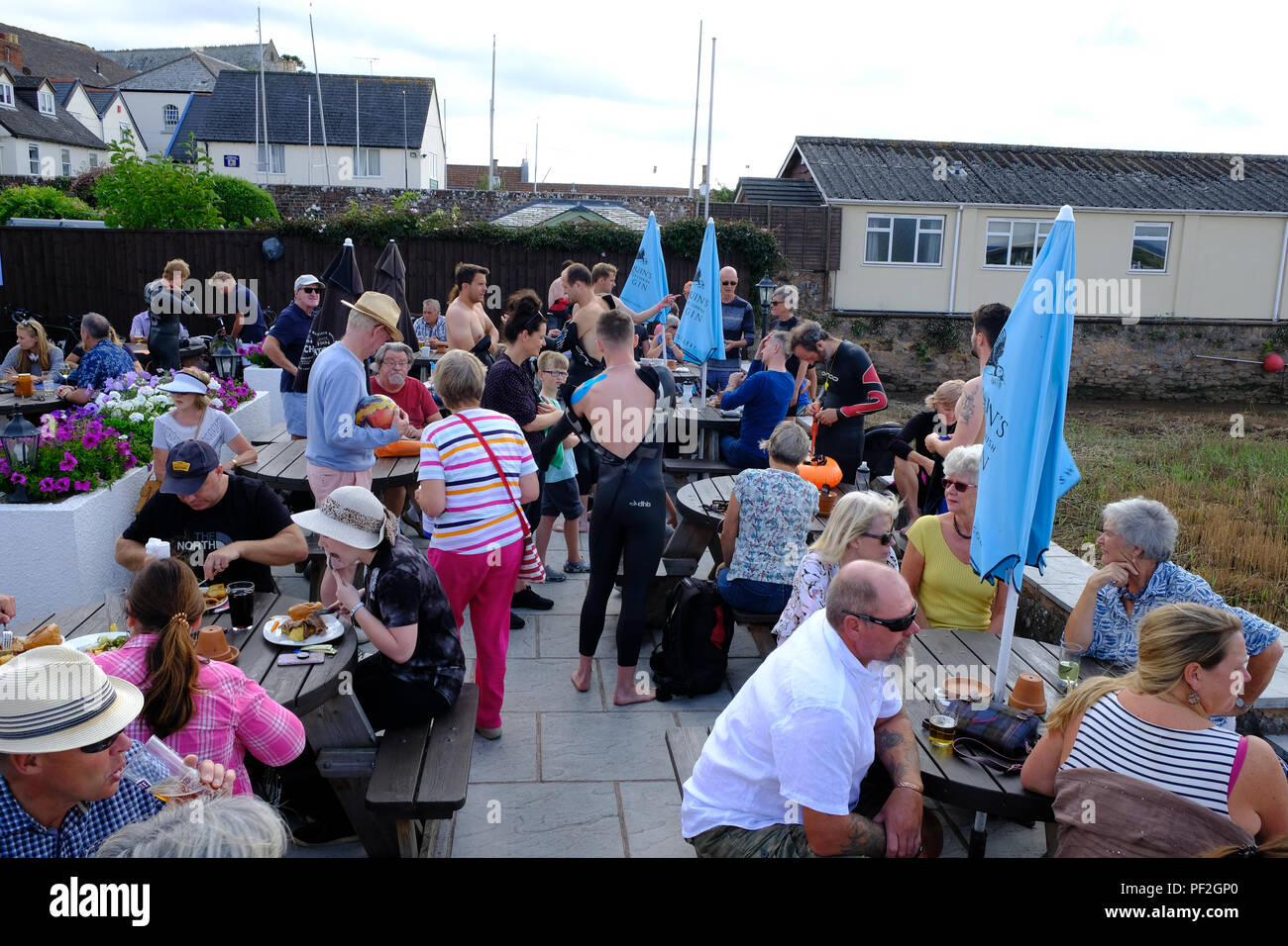 Topsham, Devon, UK. People enjoying a meal prior to the Topsham swim race, August 2018 Stock Photo