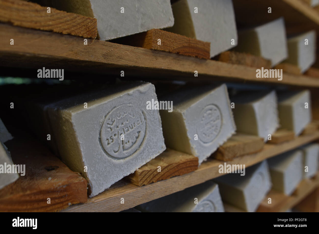 July 3, 2017 - Santeny, France: Aleppo soaps drying in the Alepia factory in Santeny, a suburb 30 kilometres east of Paris. The factory began producing traditional Aleppo soaps after factories in the Syrian city of Aleppo were destroyed during the civil war.  Reportage dans une fabrique de savons d'Alep en banlieue parisienne. Le maitre savonnier est un Syrien qui a ete oblige de fuir son pays du fait de la guerre civile. *** FRANCE OUT / NO SALES TO FRENCH MEDIA *** Stock Photo