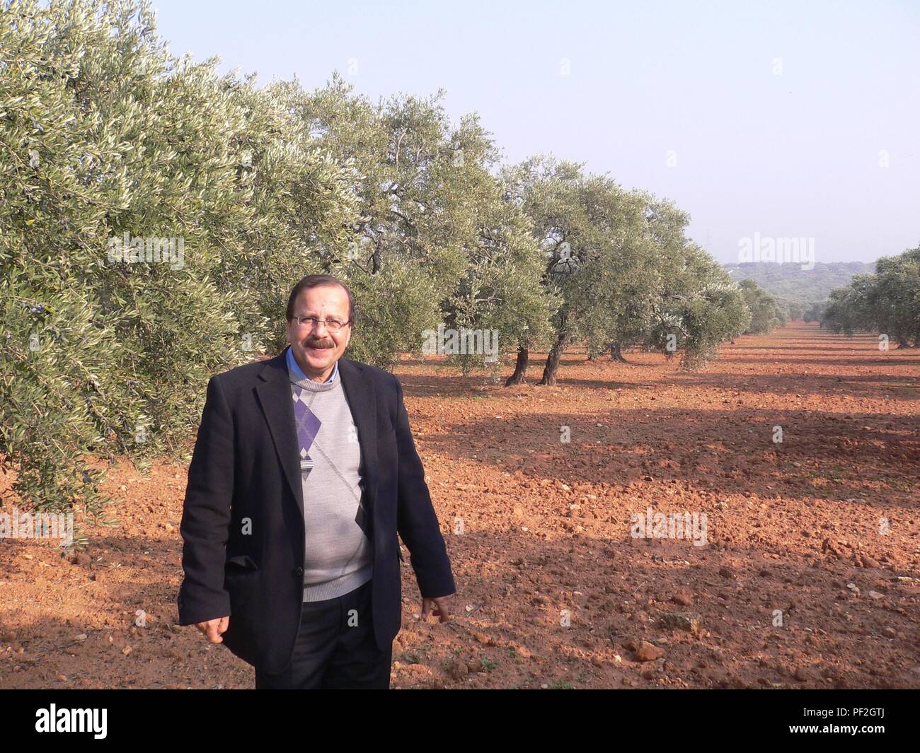 Date unknown - Syria: Undated photo of Syrian soap maker master Hassan  Harastani in an olive tree grove in Syria. Picture provided on July 3, 2017  courtesy of Samir Constantini, the owner