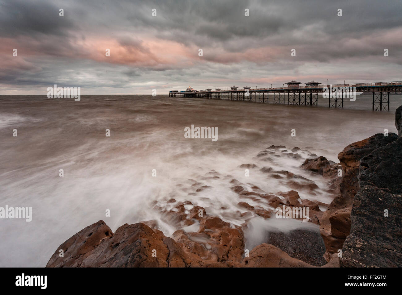 Llandudno pier on the North Wales coast in stormy weather Stock Photo