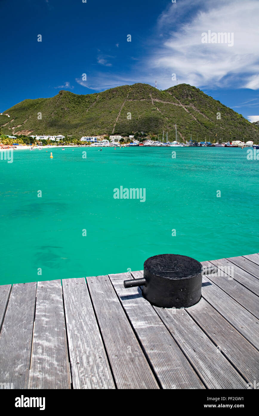Jetty and hill at Philippsburg on the island of Sint Maarten in the Caribbean sea Stock Photo