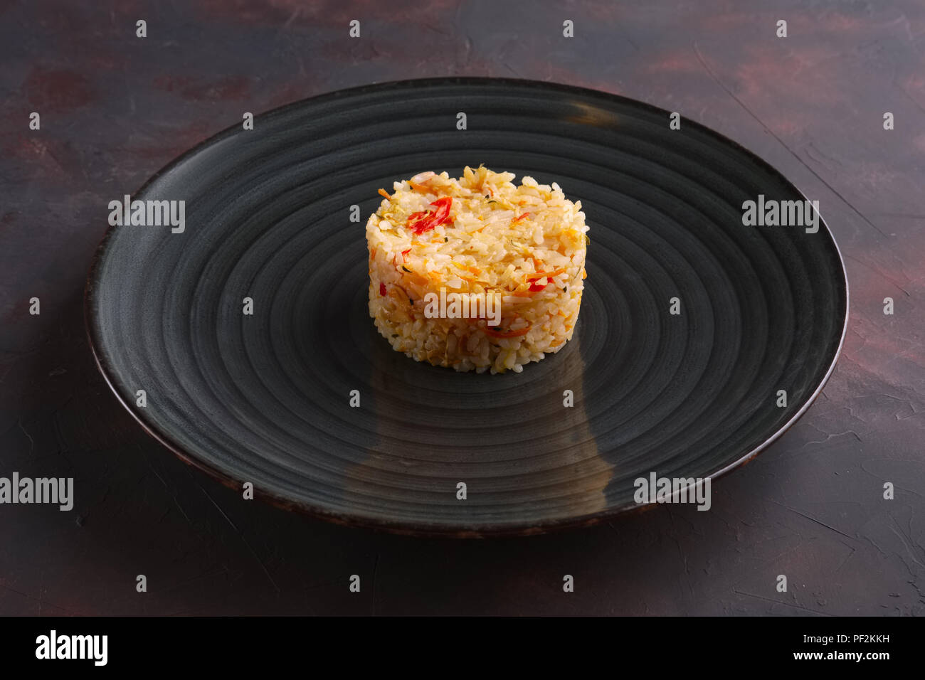 Risotto with bell pepper and sun dried romatos Stock Photo - Alamy
