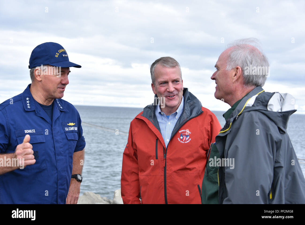 Coast Guard Commandant Adm. Karl Schultz meets with Secretary of the Navy Richard V. Spencer and Alaska Sen. Dan Sullivan in Nome and Port Clarence, Alaska to discuss the construction of deep draft ports in western Alaska, Aug. 13, 2018. This would allow the Coast Guard and Navy to have a strong presence in the U.S. Arctic. U.S. Coast Guard photo by Petty Officer 1st Class Jetta Disco. Stock Photo