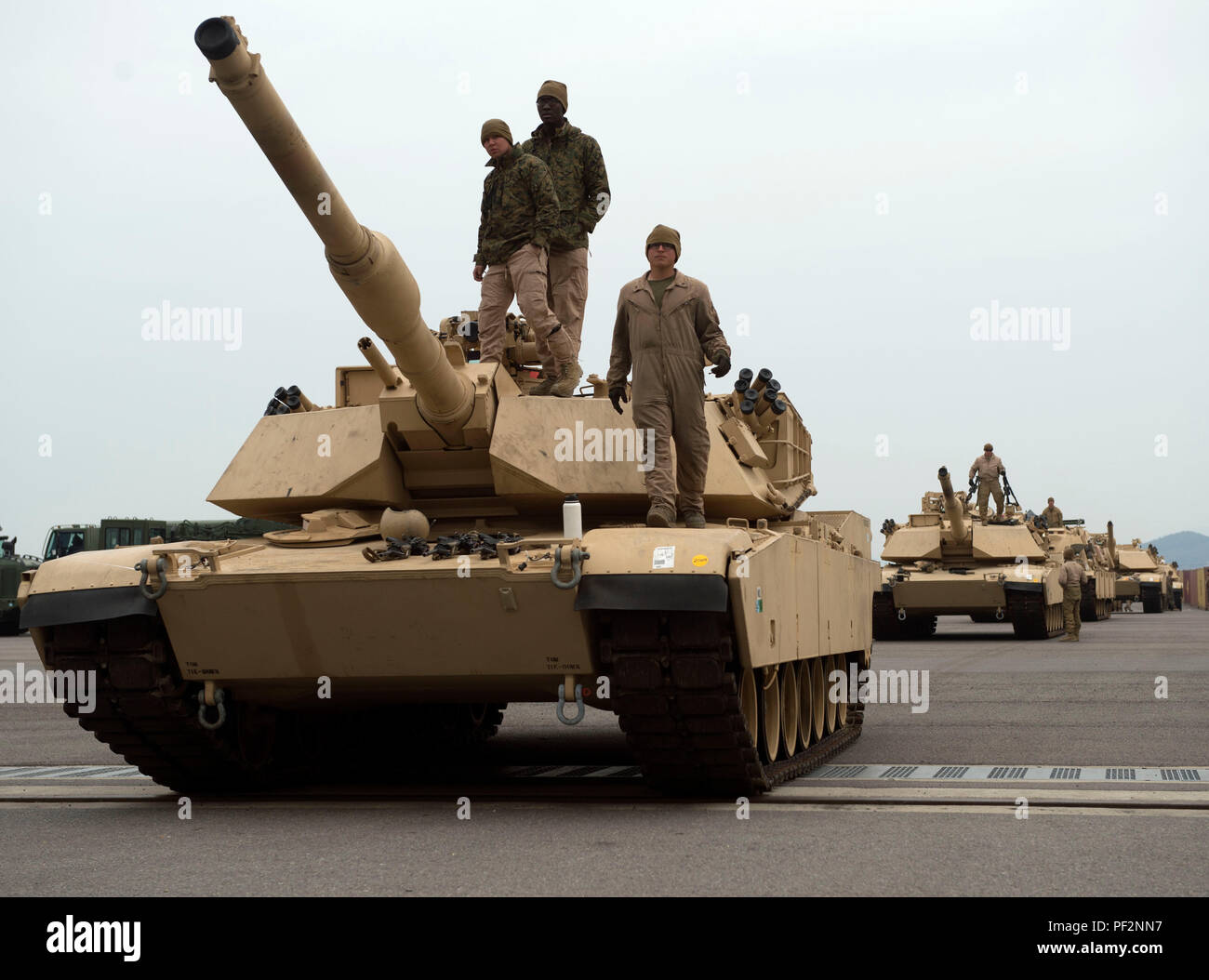 160313-N-KB426-005GWANGYANG, REPUBLIC OF KOREA (Mar. 13, 2016) – M1A1 Abrams Main Battle Tanks, attached to Delta Company 1st Tank Battalion, Delta Company, 1st U.S. Marine Division, prepare to embark amphibious dock landing ship USS Germantown (LSD 42). Germantown is assigned to the Bonhomme Richard Expeditionary Strike Group (BHRESG) and is participating in Ssang Yong 16 a biennial combined amphibious exercise designed to strengthen interoperability and working relationships across a wide range of military operations from disaster relief to complex expeditionary operations. (U.S. Navy photo  Stock Photo