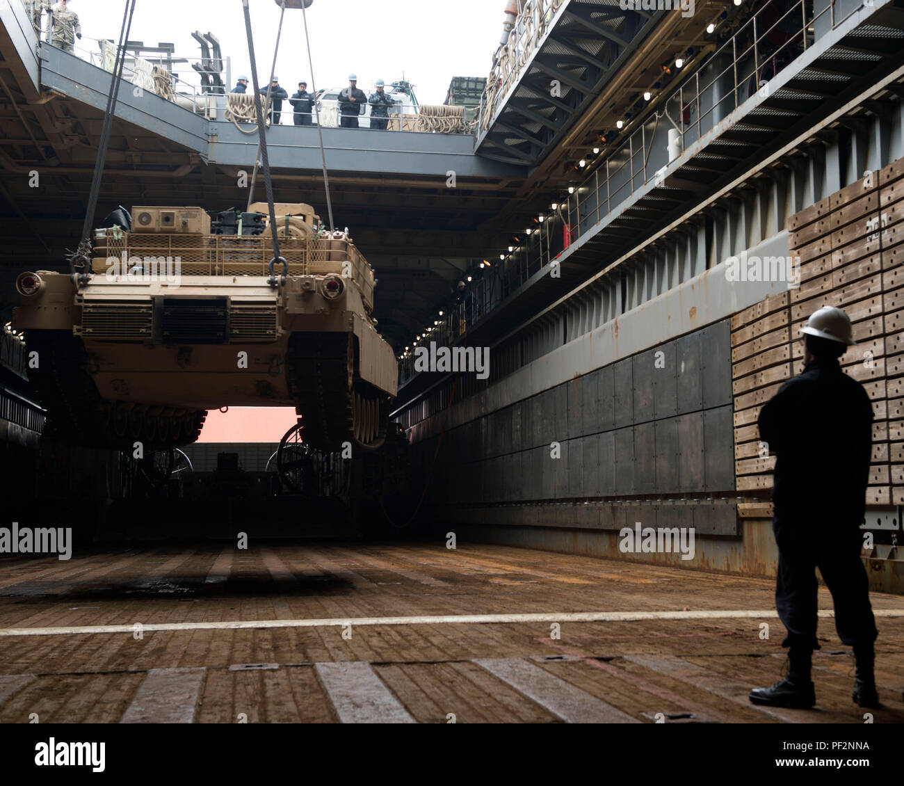 160313-N-KB426-073GWANGYANG, REPUBLIC OF KOREA (Mar. 13, 2016) – Amphibious dock landing ship USS Germantown (LSD 42) onloads a M1A1 Abrams Main Battle Tank, attached to Delta Company 1st Tank Battalion, Delta Company, 1st U.S. Marine Division. Germantown is assigned to the Bonhomme Richard Expeditionary Strike Group (BHRESG) and is participating in Ssang Yong 16 a biennial combined amphibious exercise designed to strengthen interoperability and working relationships across a wide range of military operations from disaster relief to complex expeditionary operations. (U.S. Navy photo by Mass Co Stock Photo
