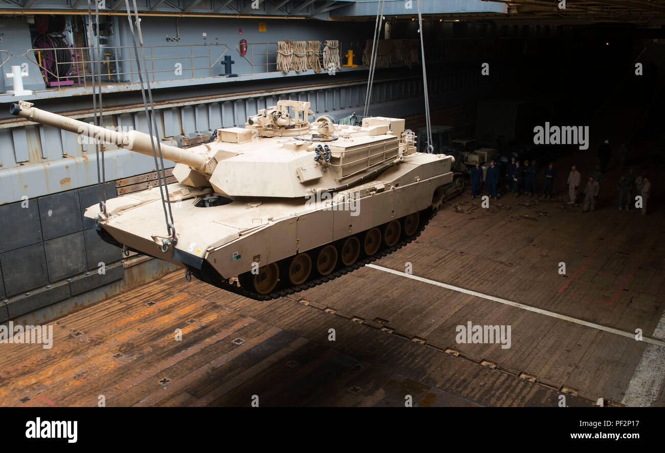 160313-N-KB426-052  GWANGYANG, Republic of Korea (March 13, 2016) Amphibious dock landing ship USS Germantown (LSD 42) onloads a M1A1 Abrams Main Battle Tank, attached to Delta Company 1st Tank Battalion, Delta Company, 1st U.S. Marine Division. Germantown is assigned to the Bonhomme Richard Expeditionary Strike Group (BHRESG) and is participating in Ssang Yong 16 a biennial combined amphibious exercise designed to strengthen interoperability and working relationships across a wide range of military operations from disaster relief to complex expeditionary operations. (U.S. Navy photo by Mass C Stock Photo