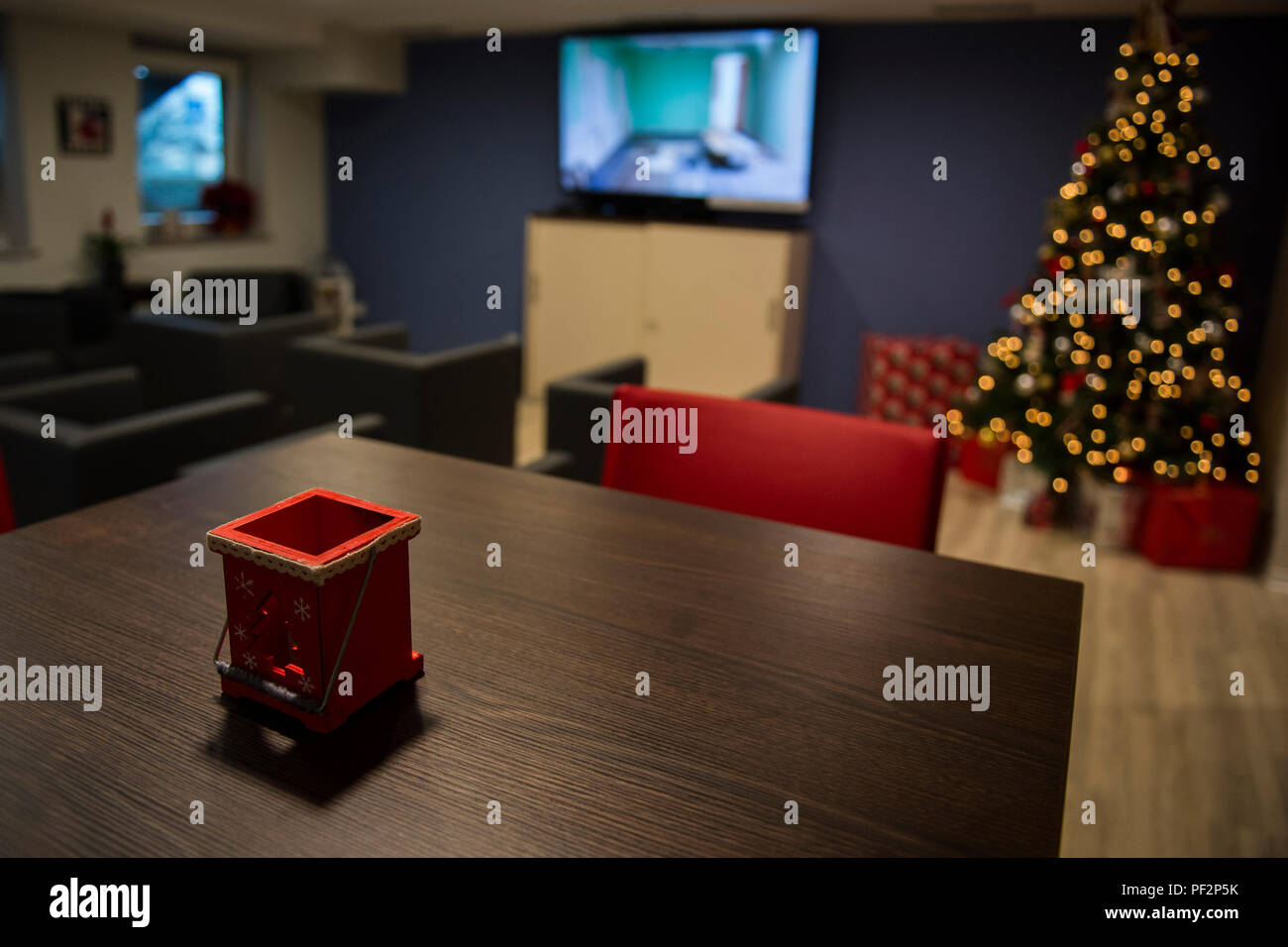 A Holiday Decorations Sits On Top Of A Table In The Newly Opened