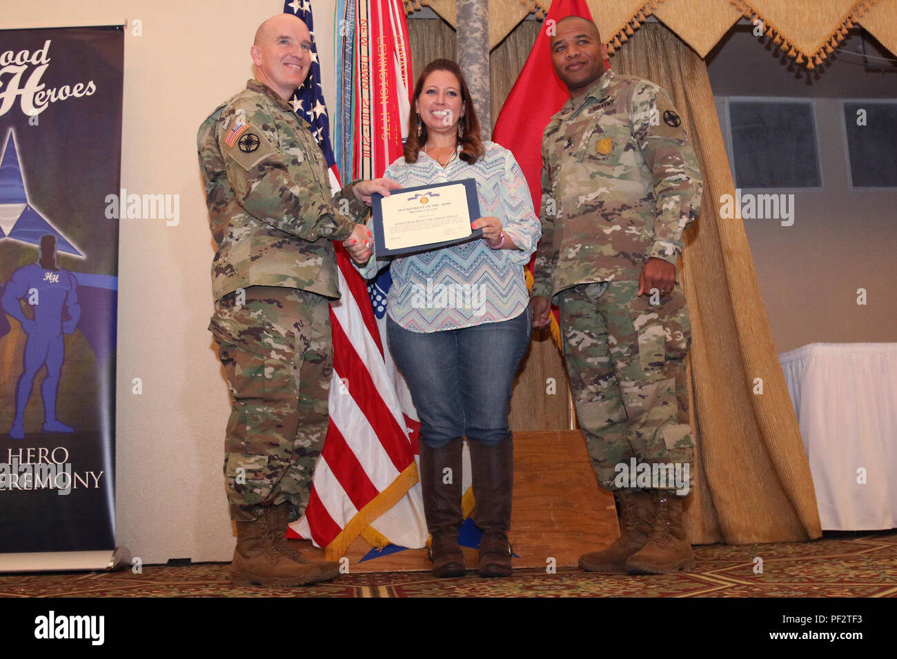 Meghan Killen (center), the family readiness program coordinator for
