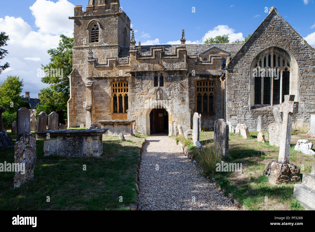Stanton, UK - 8th August 2018: The Church of St Michael and All Angels in Stanton in the Cotswold district of Gloucestershire.The village is built alm Stock Photo