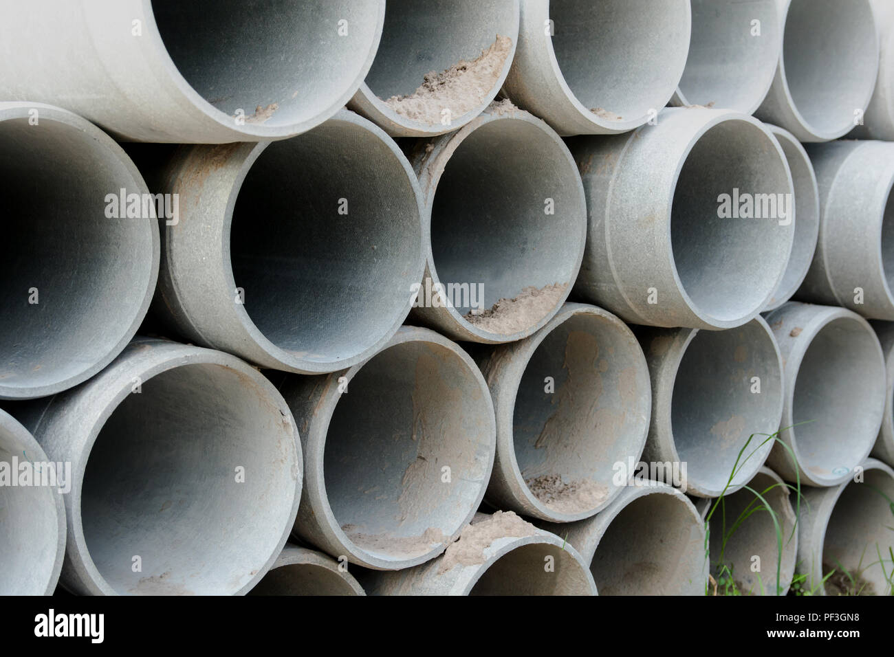 Close up concrete, cement pipes stacking, pattern background. concrete