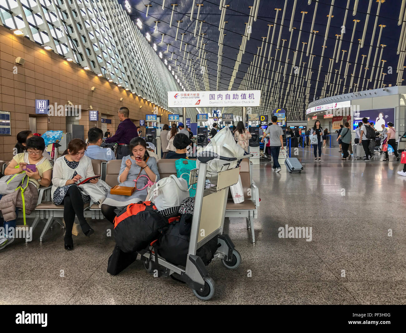 Shanghai, Jiangsu, China.  Shanghai Pudong Airport, Departures Hall. Stock Photo