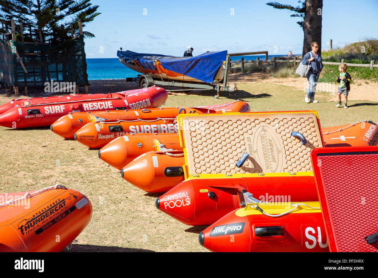 Surf rescue dinghy boats being cleaned ahead of the surf life saving