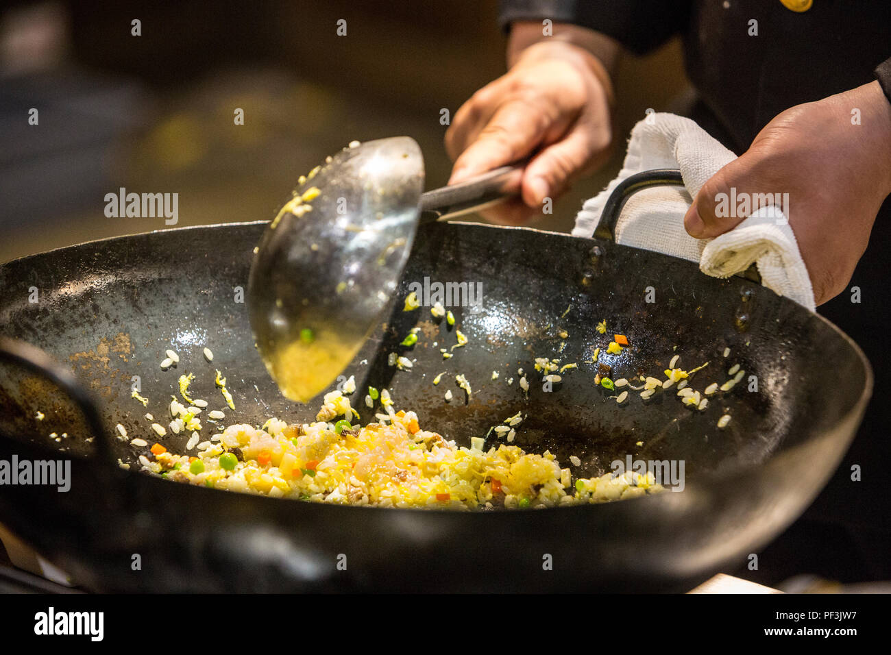Yangzhou, Jiangsu, China. Chinese Chef Preparing Yangzhou Fried Rice ...