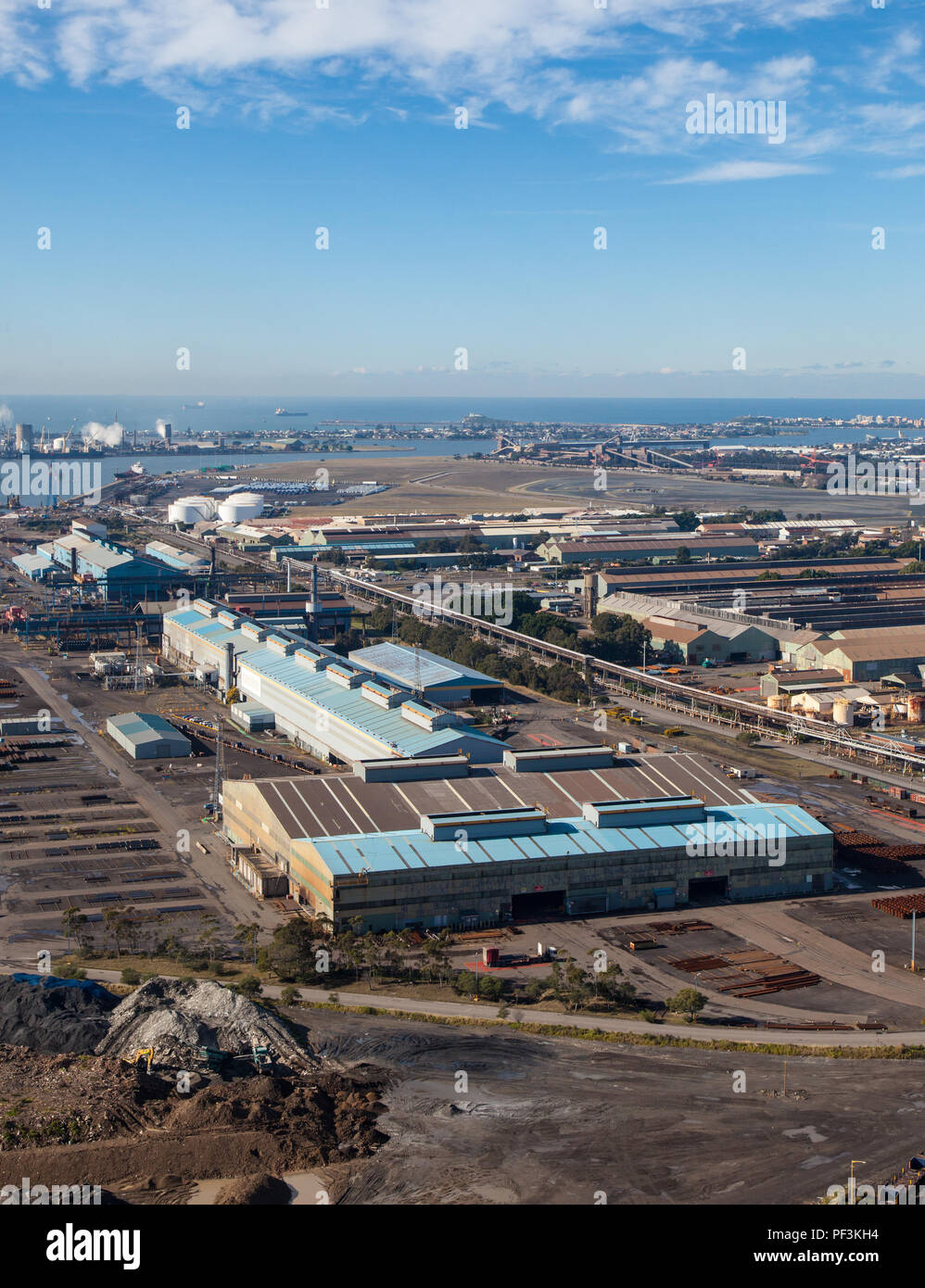 Aerial view of Newcastle port industrial area. Newcastle is an important industrial area with steel manufacturing and coal industry the dominant heavy Stock Photo