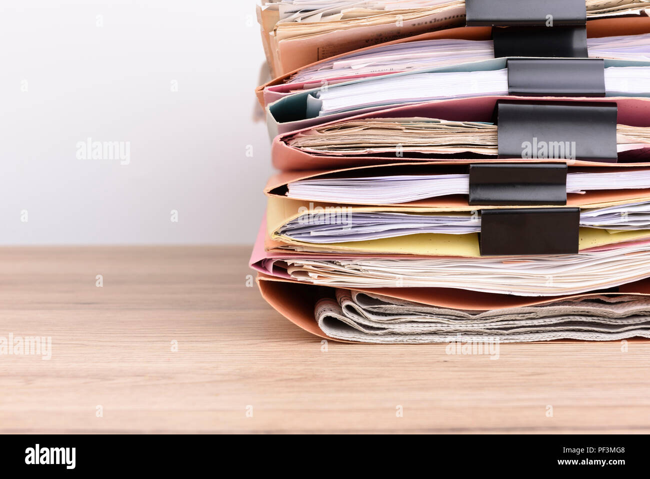 Stacked documents on the office desk. Stock Photo