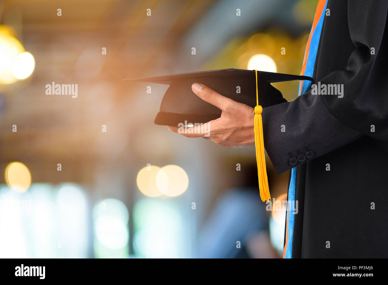 Graduation cap throwing hands hi-res stock photography and images - Alamy