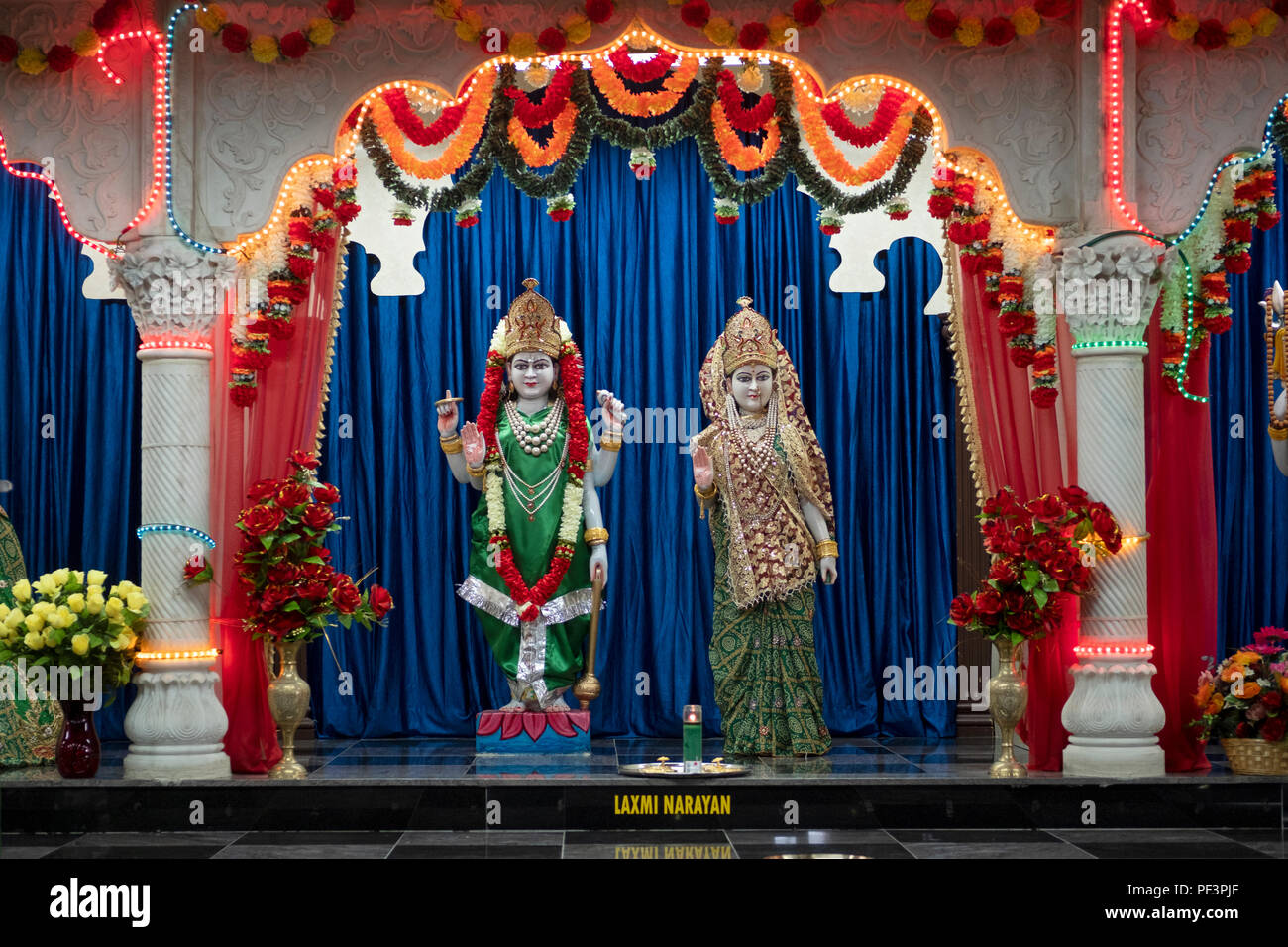 Statues of the Hindu deities Lakshmi and Narayan at a temple in Woodside, Queens, New York. Stock Photo