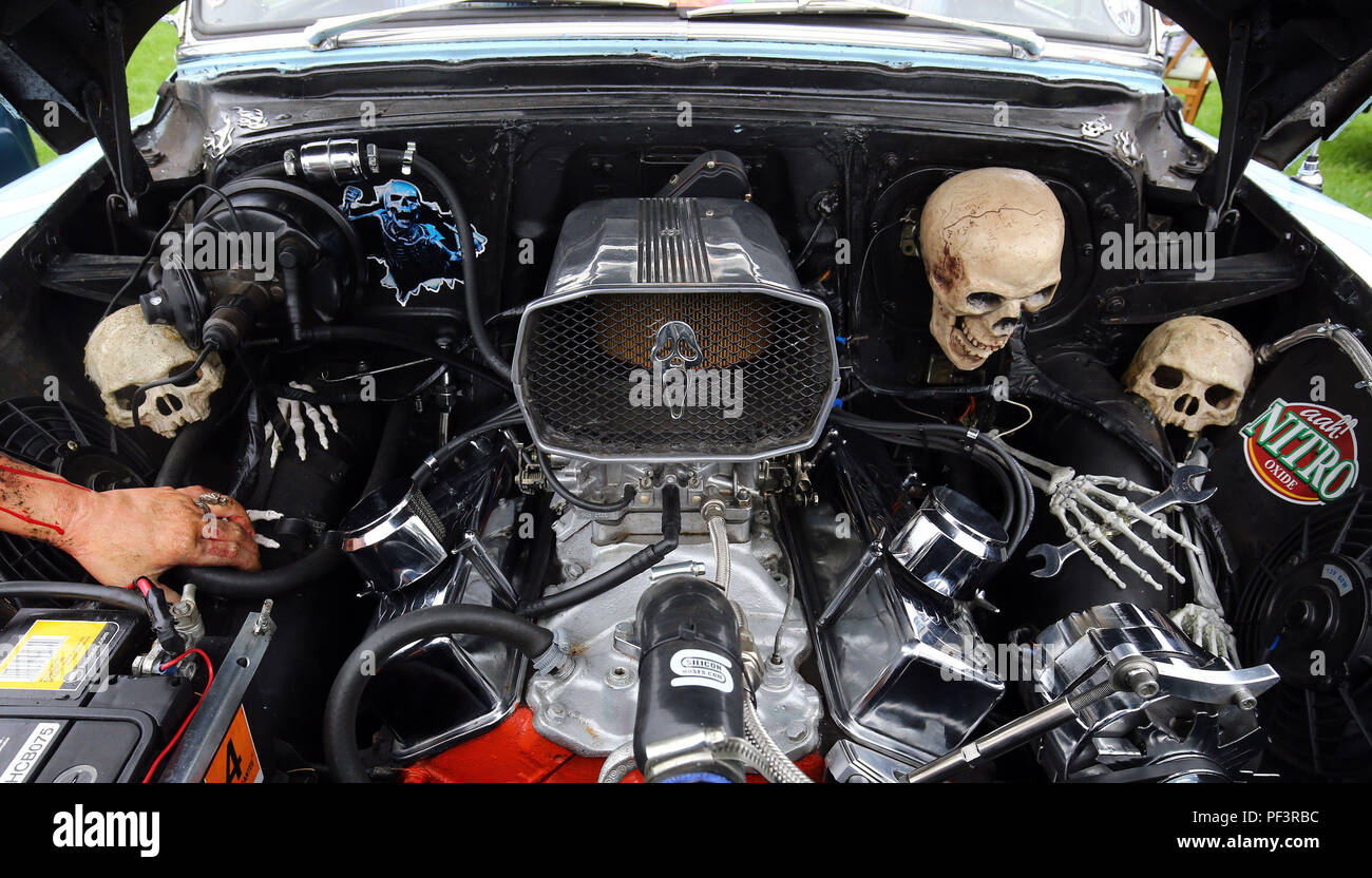 A view of an engine bay during the London Cartel International Auto Show, at the South of England Showground, West Sussex, where over 2000 classic and retro cars are being showcased. Stock Photo