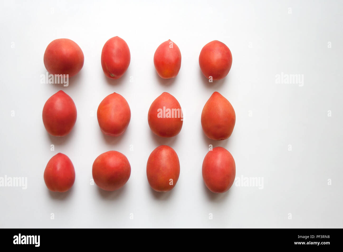 Ripe plum tomatoes isolated on white background from a high angle view Stock Photo