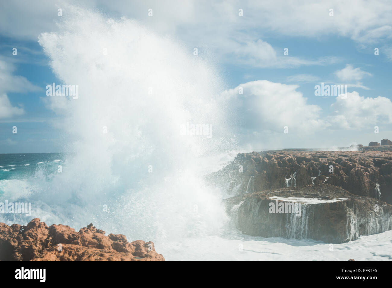 Wave hitting the shore at Quobba Blowholes, Western Australia, WA, Australia, Indian Ocean, Oceania Stock Photo