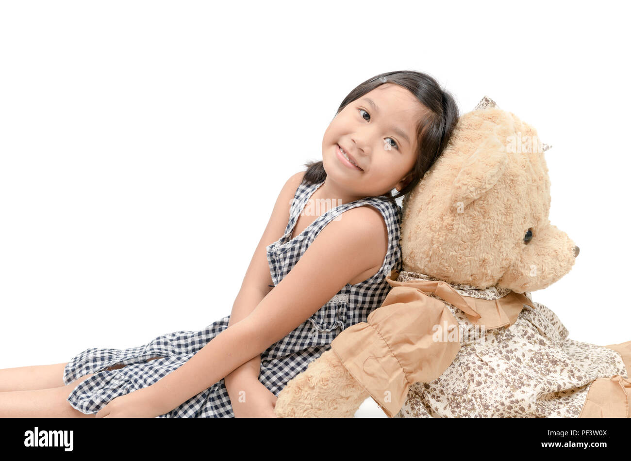 Girl holding big teddy bear hi-res stock photography and images - Alamy