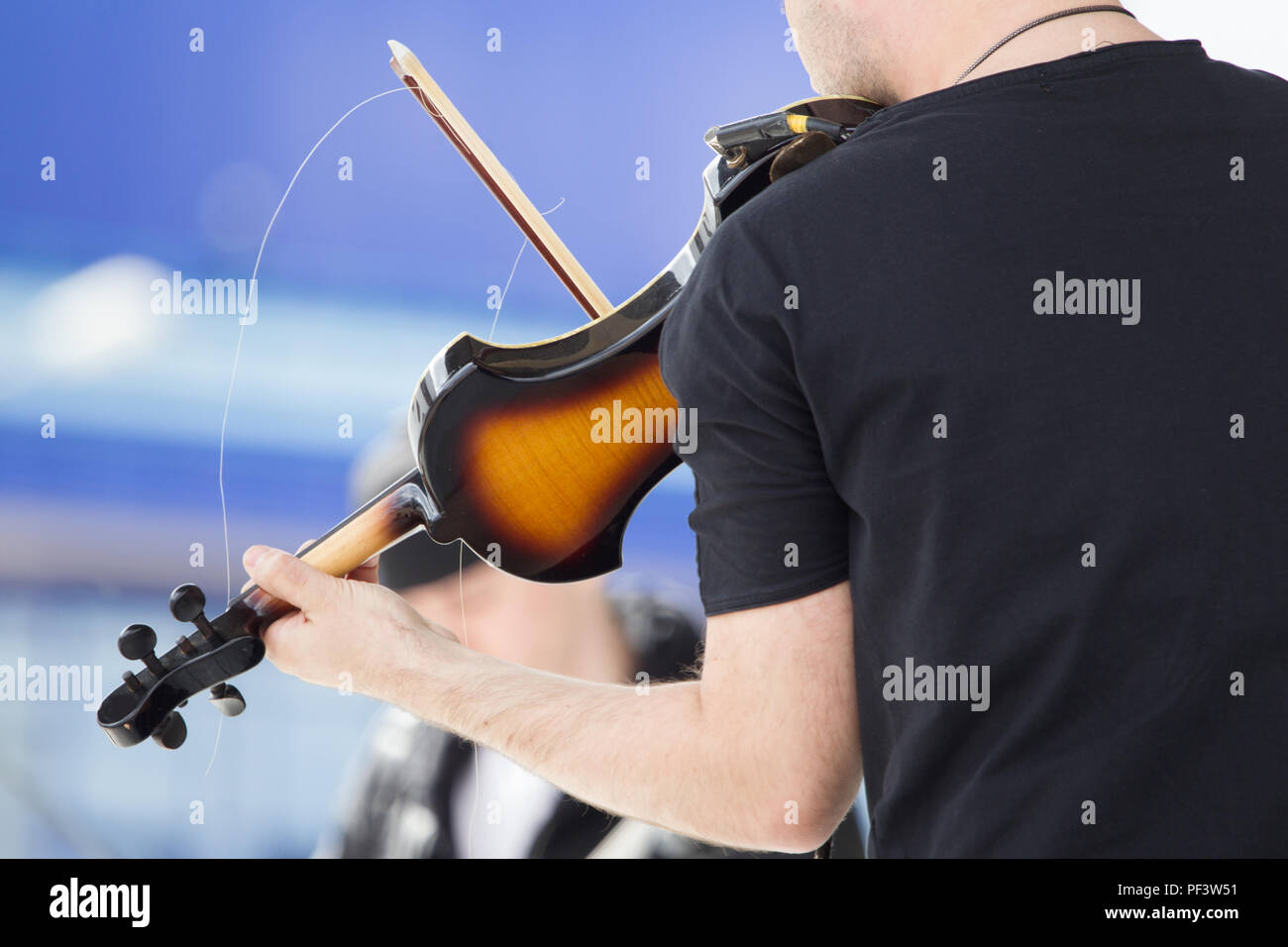 Playing electric violin Stock Photo Alamy