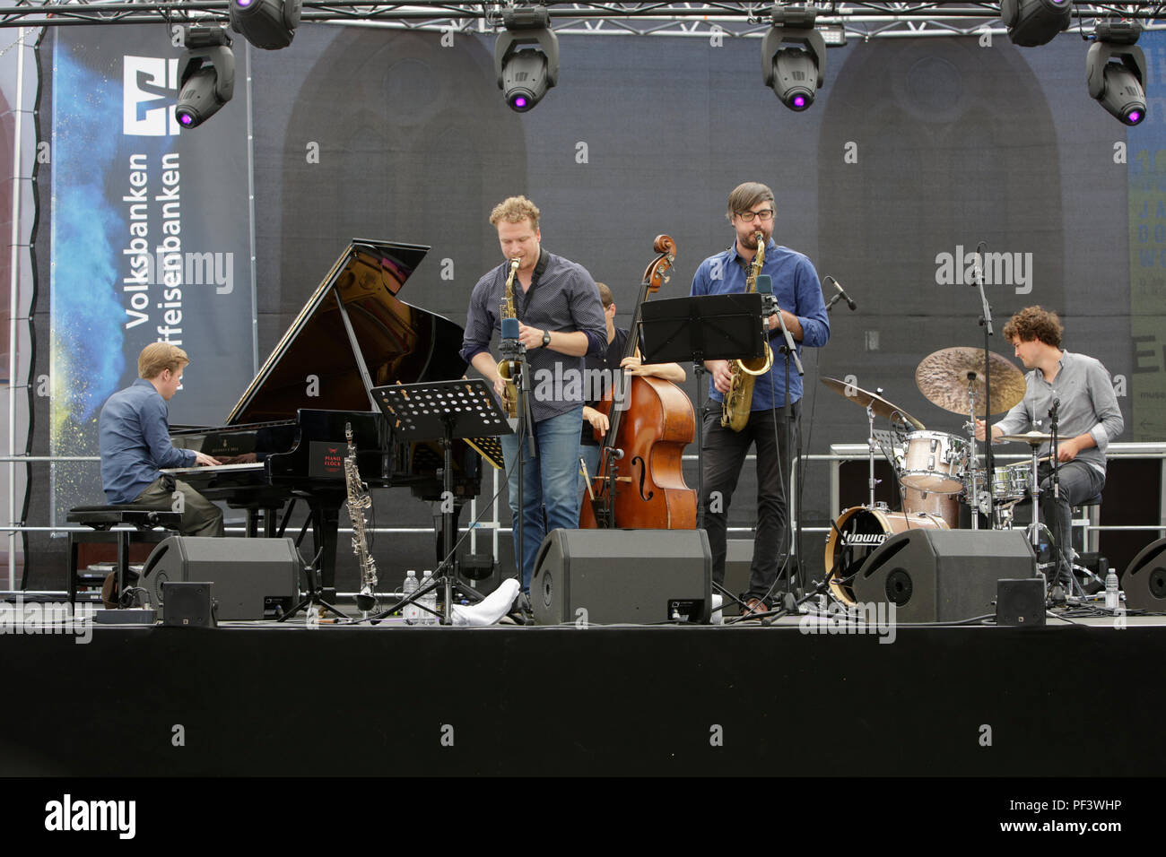 Worms, Germany. 18th Aug, 2018. The Volker Engelberth Quintett, pianist Volker Engelbert, saxophonist Bastian Stein, bassist Arne Huber, saxophonist Alexander ‘Sandi' Kuhn and drummer Silvio Morger from left to right, perform live at the 2018 Jazz and Joy Festival in Worms in Germany. Credit: Michael Debets/Pacific Press/Alamy Live News Stock Photo