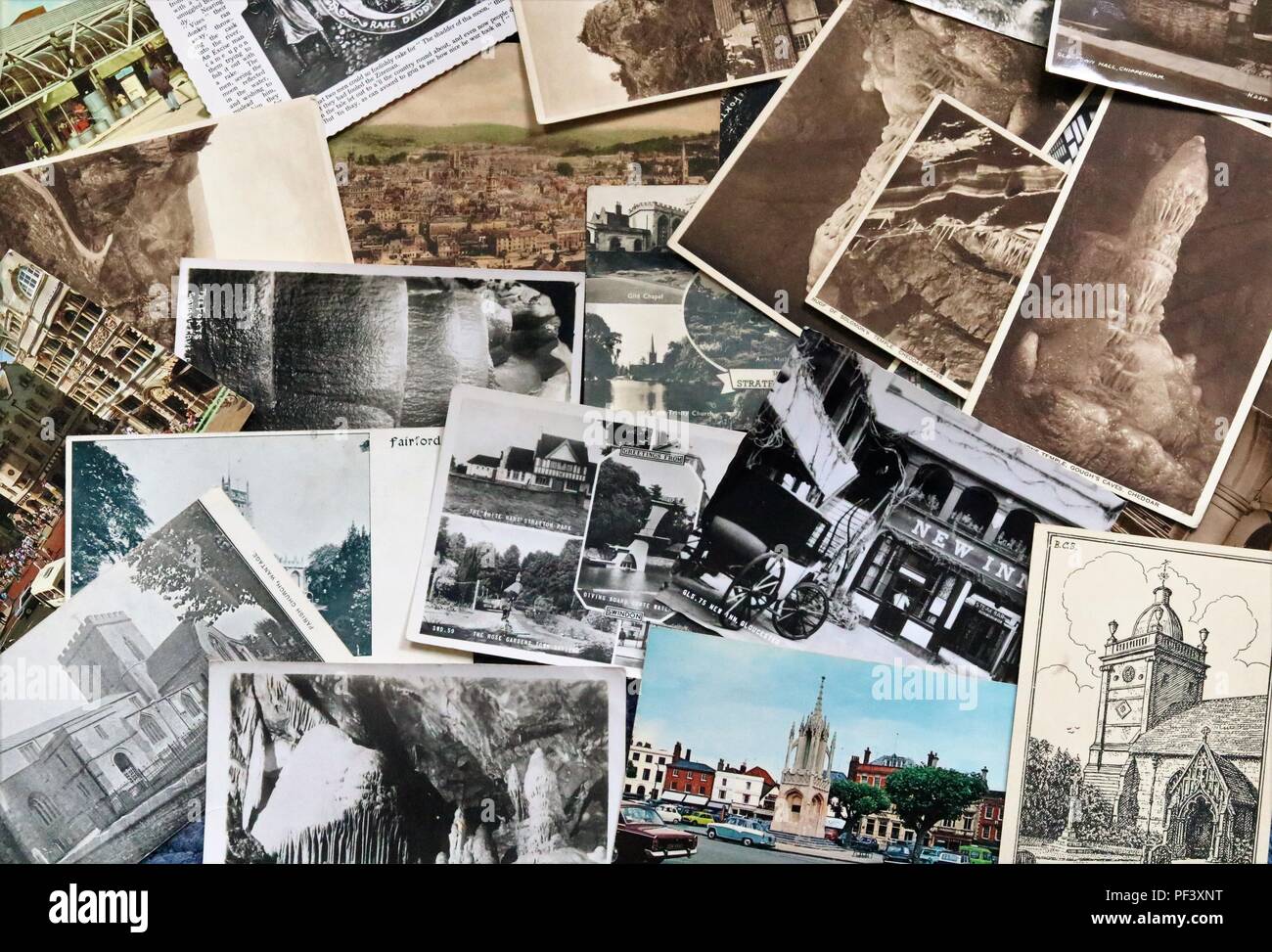 Old black and white and early colour postcards social history Stock