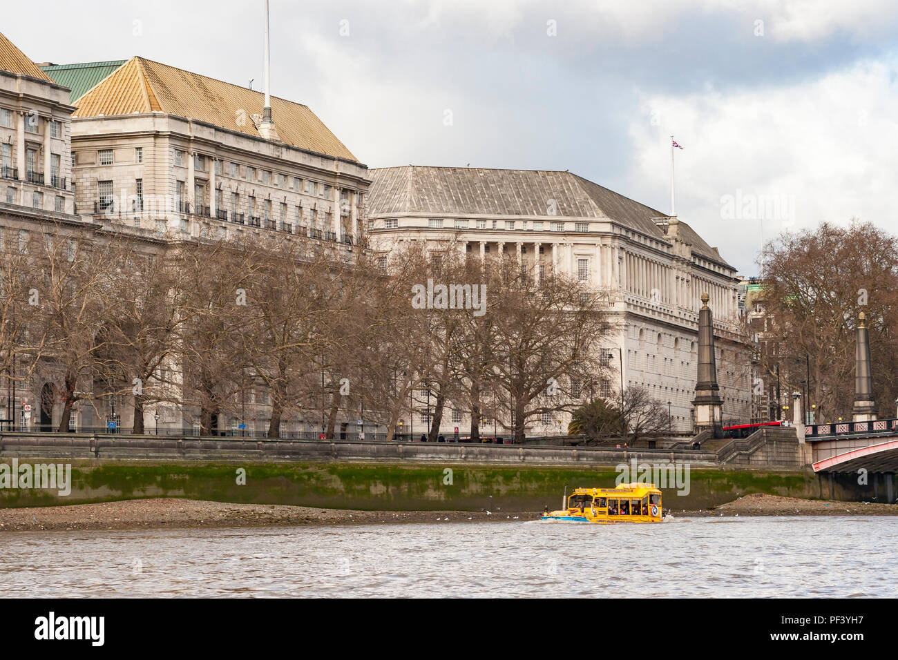 Thames House London, Home of the MI5, with a Duck tour boat passing by Stock Photo