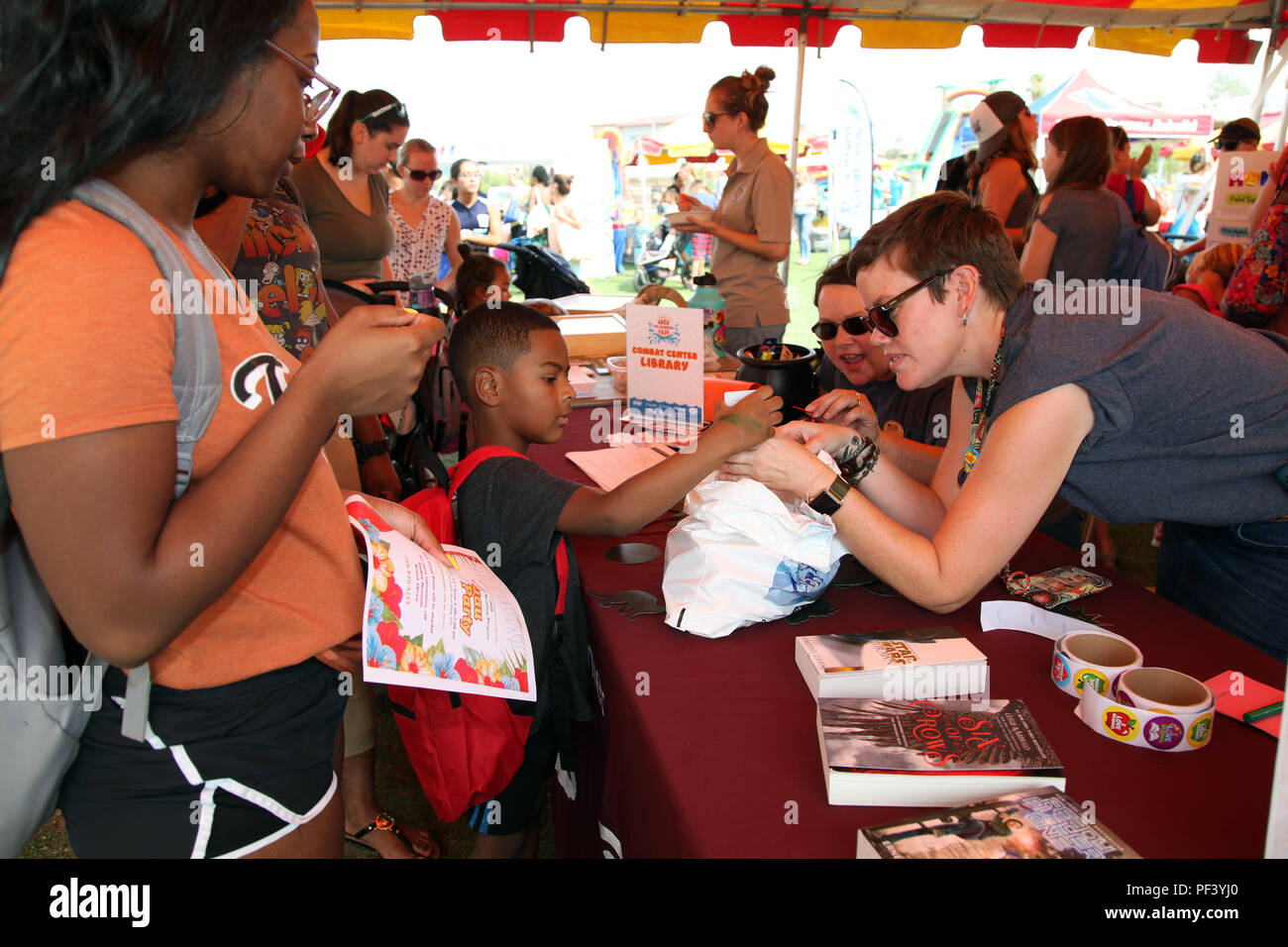 Kelley Loftis, right, and Crystal Dean of the Combat Center Library