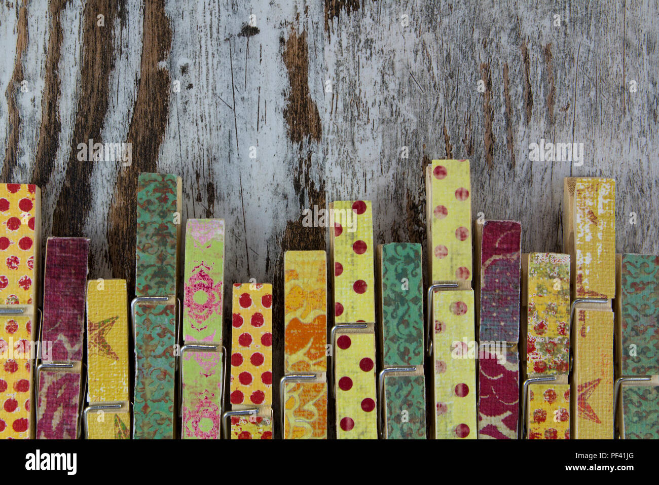 Handmade clothespins in a wood background, vintage Stock Photo - Alamy
