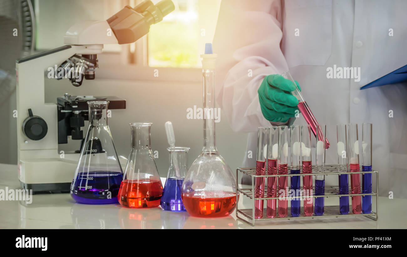 scientist with equipment and science experiments in laboratory Stock ...