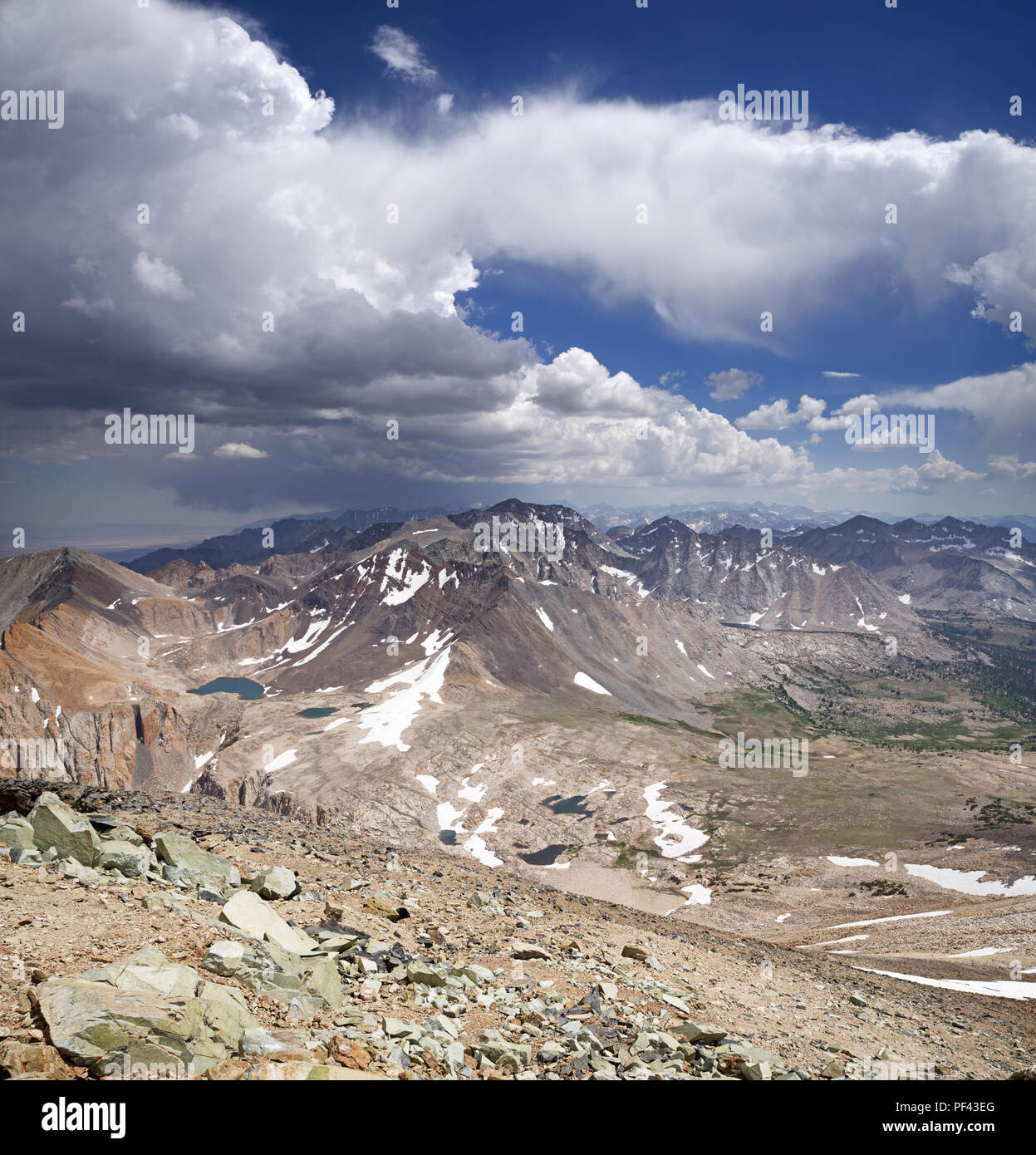 Sierra Nevada Landscape from Cardinal Mountain looking south across Taboose Pass with clouds and distant weather Stock Photo