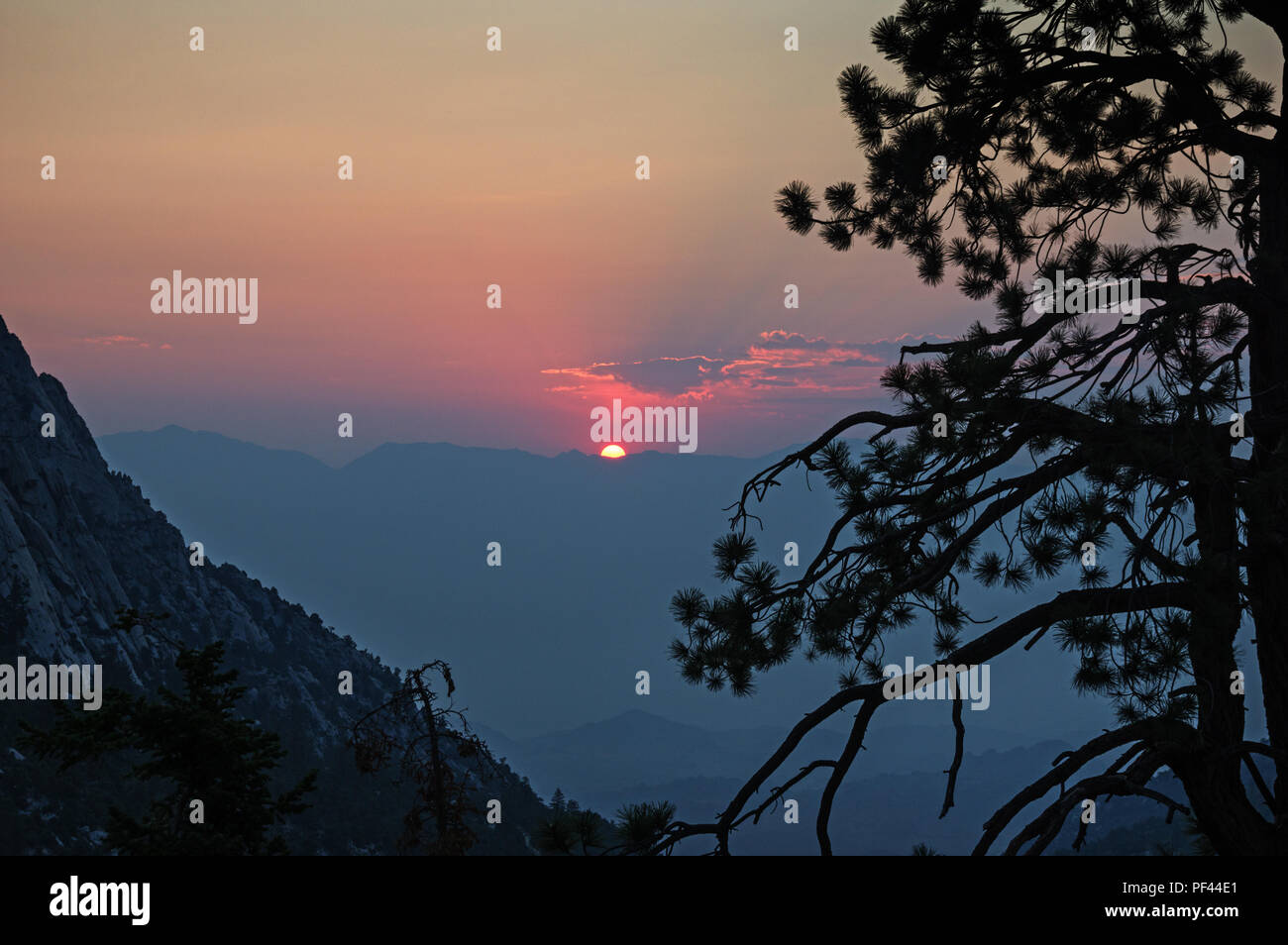 sunrise over the Inyo Mountains from above Whitney Portal in the Sierra Nevada of California Stock Photo