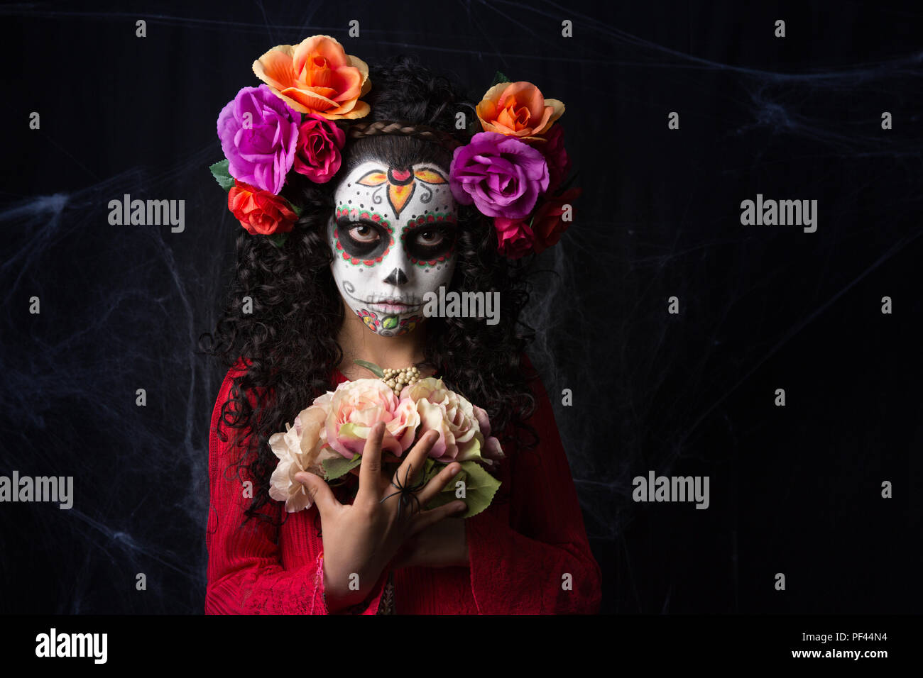 Closeup portrait of Calavera Catrina. Little girl with sugar skull makeup.  Dia de los muertos. Day of The Dead. Halloween Stock Photo - Alamy