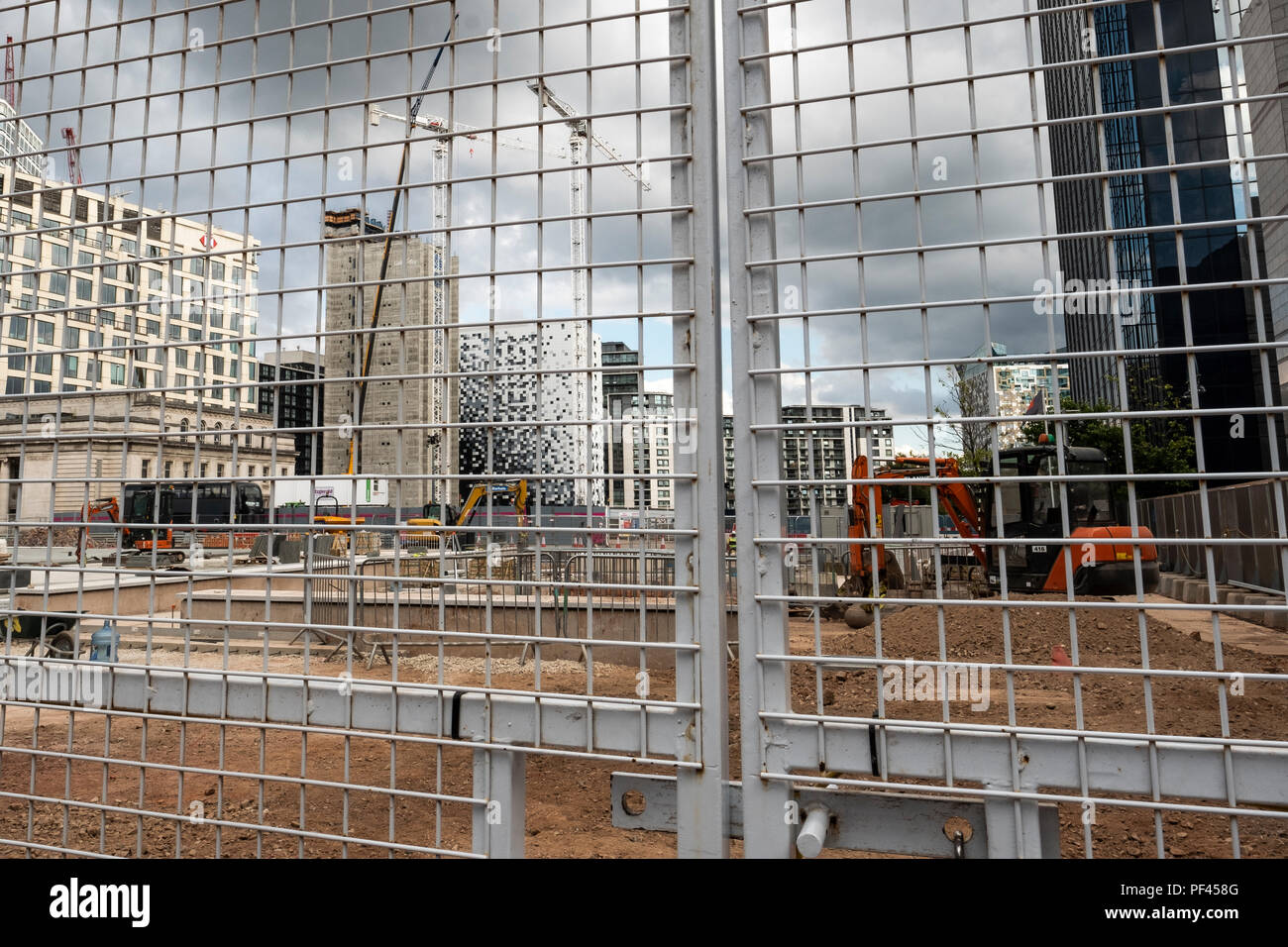 View through wire fencing across Centenary Square redevelopment in Birmingham Stock Photo