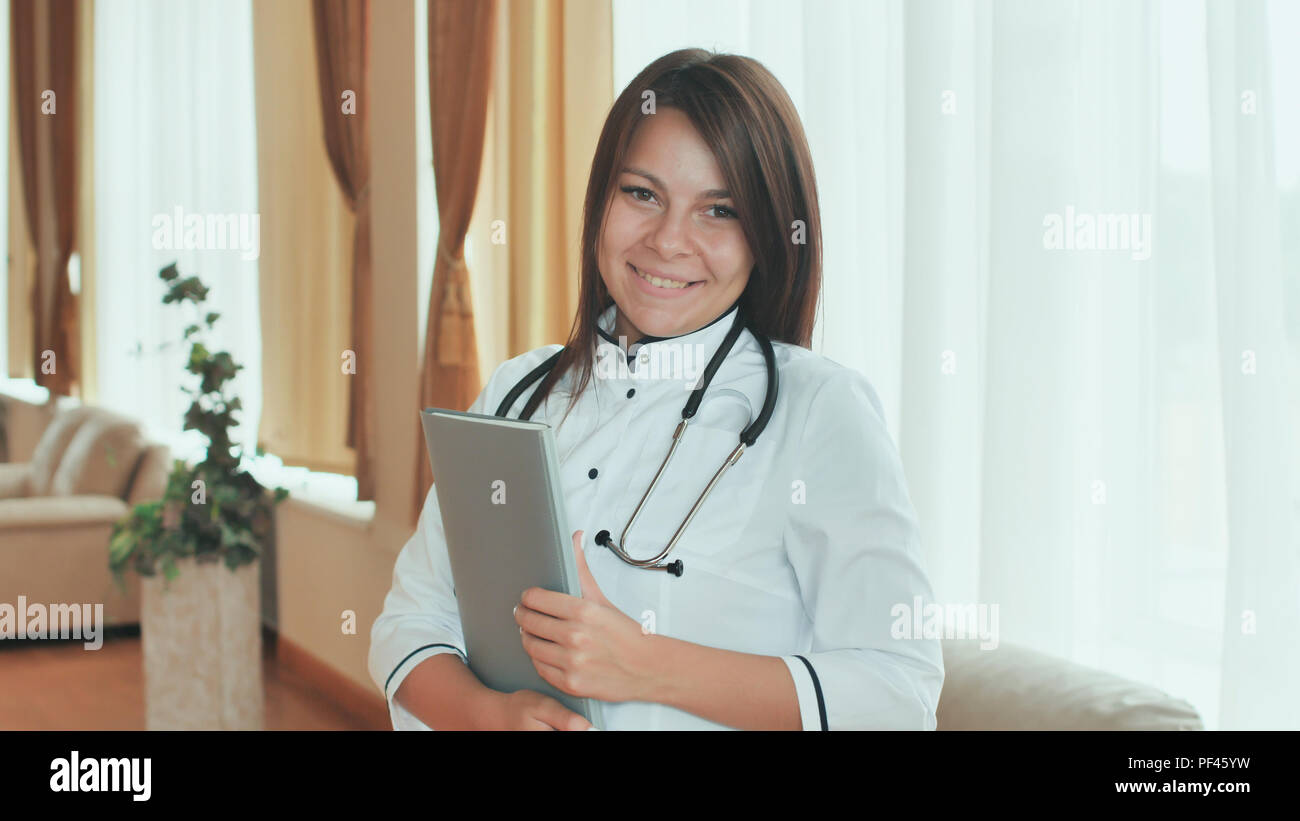 Portrait of a young female doctor in a good mood. Stock Photo