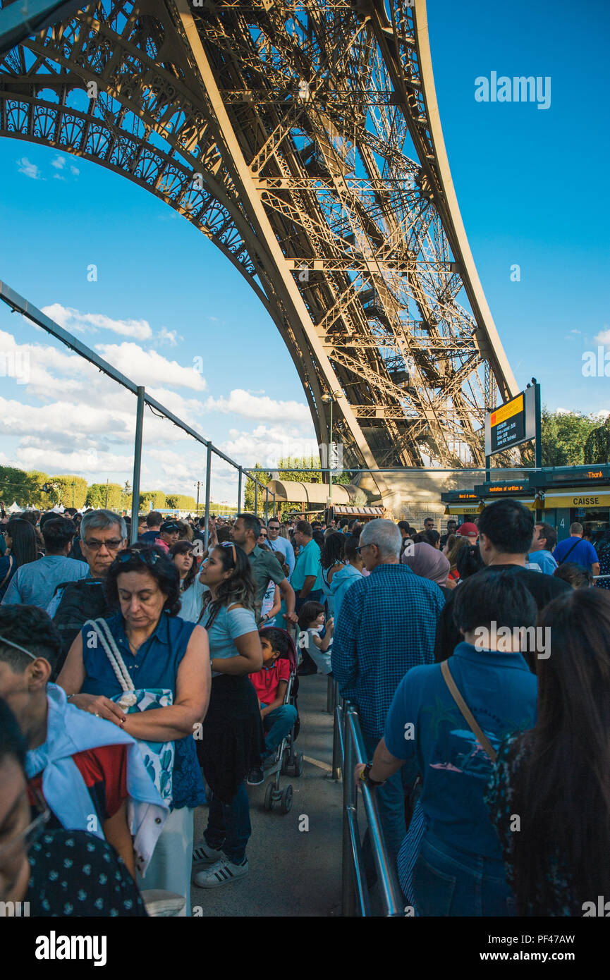 People waiting to enter the Eiffel tower, Paris France Stock Photo