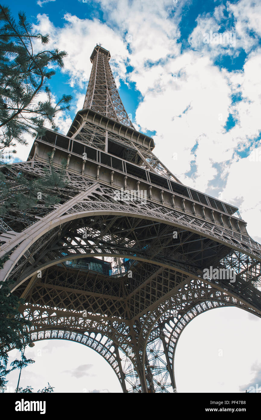 Eiffel Tower with cloudy, blue sky Stock Photo