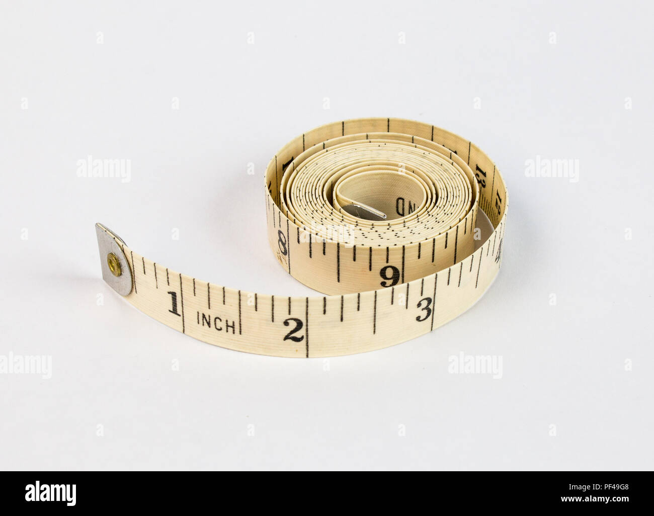 Tailors measuring tape on isolated on white background Stock Photo