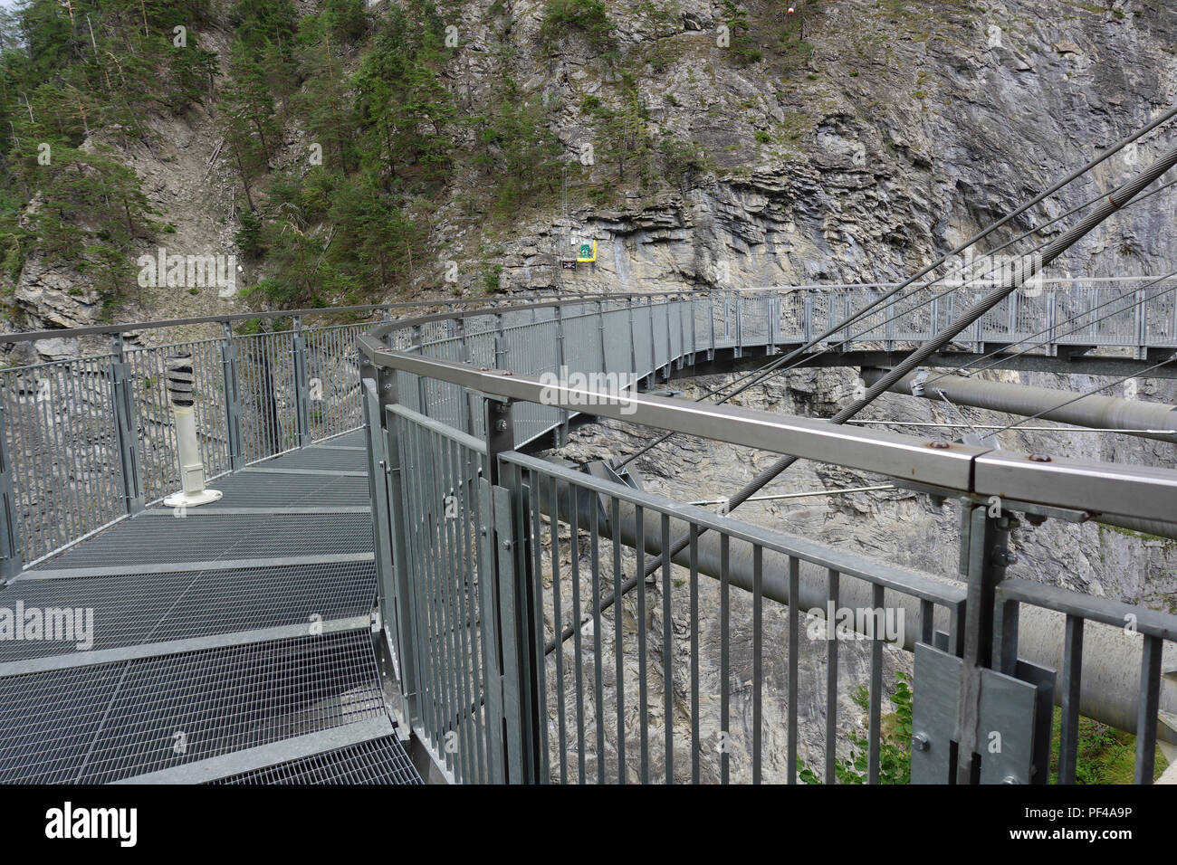 Footbridge suspended over the gorge of Pre-Saint-Didier park - Pre-Saint-Didier, Aosta / Italy Stock Photo