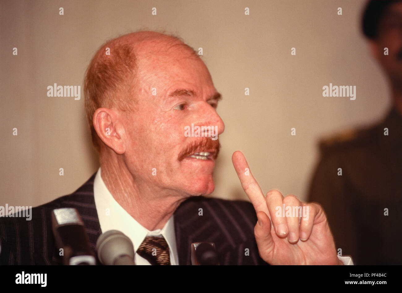 Baghdad, Iraq - 16 October 1995 - Izzat Ibrahim al-Douri, Iraqi statesman and Vice Chairman of the Iraqi Revolutionary Command Council and head of the elections committee for the Presidential Referendum on 15 Ocotober 1995, announces the results to the press, where President Saddam Hussein won 99.96% of the vote.    The only question on the paper ballot of the referendum was "Do you approve of President Saddam Hussein being President of the Republic? Iraqi's find it harder to maintain a decent standard of living due to the strict UN sanctions imposed during the 1990s because of Iraq's invasion Stock Photo