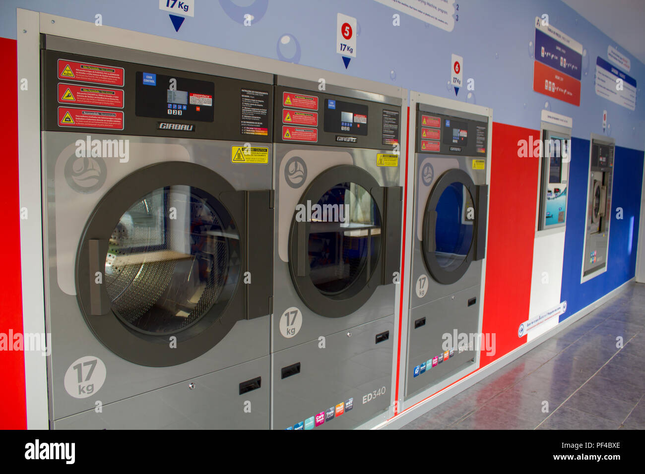 Washing machines in the self service laundry Stock Photo