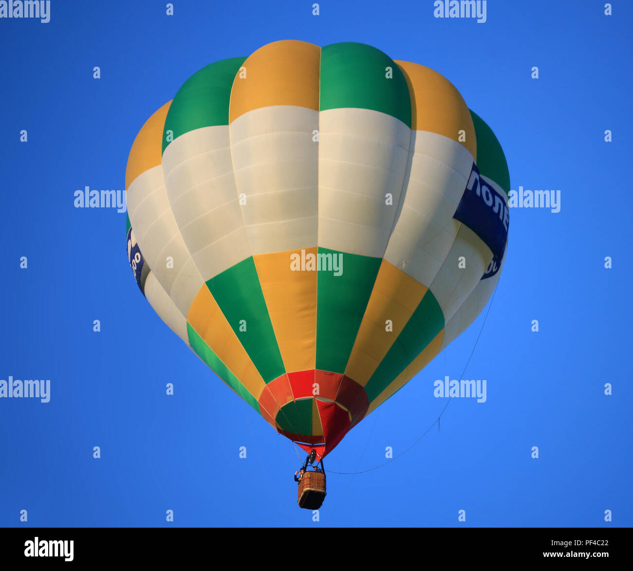 Hot air balloon in the blue sky photo Stock Photo