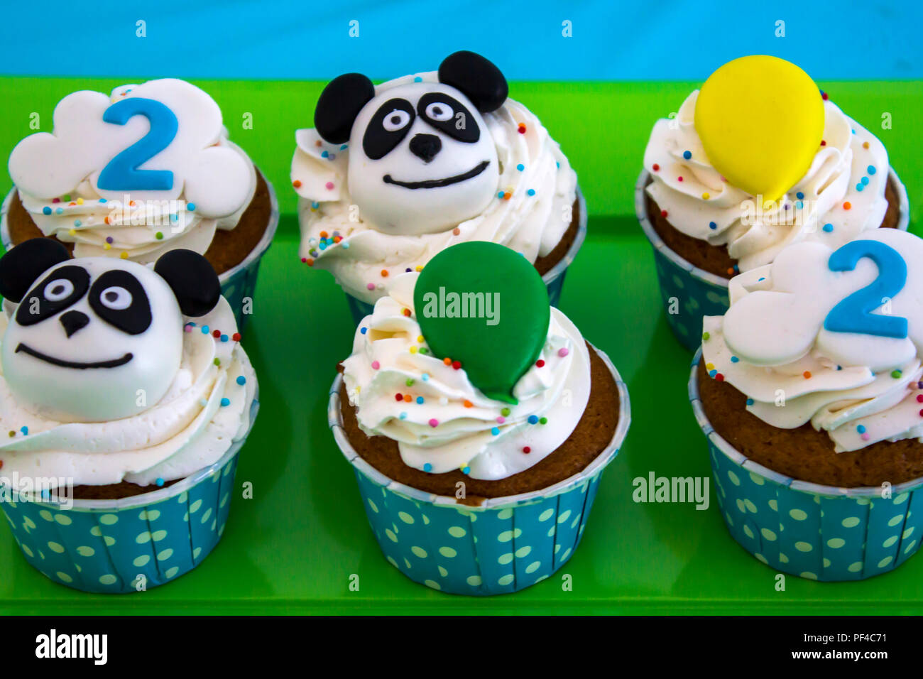 Tasty birthday cupcakes Stock Photo